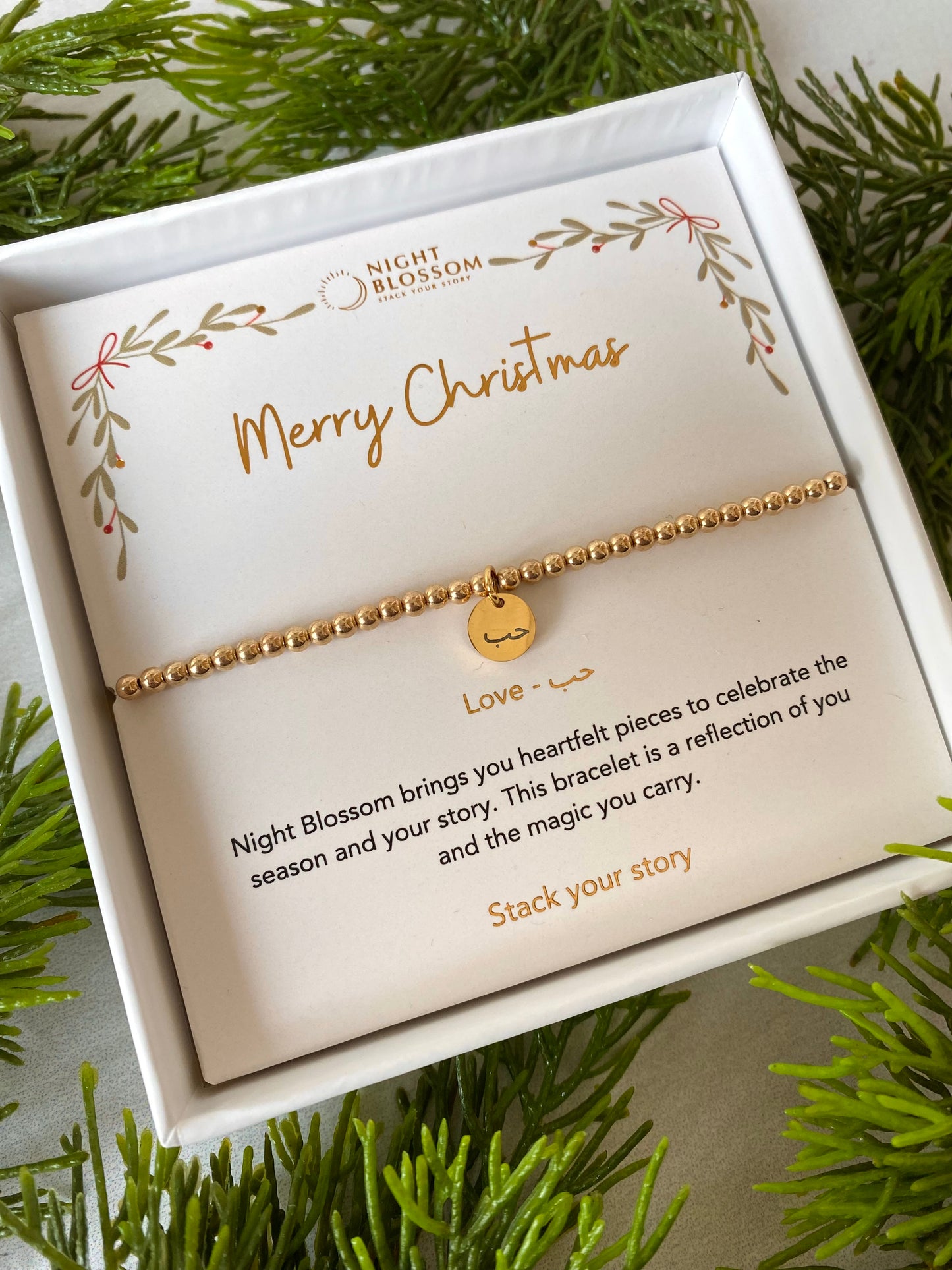 Festive gold affirmation charm bracelet