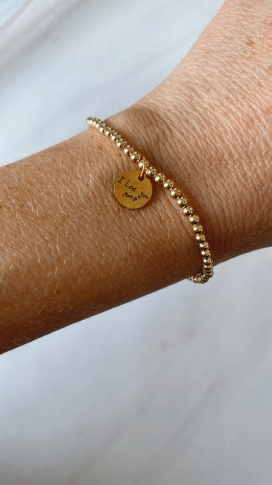 Gold handwritten charm bracelet