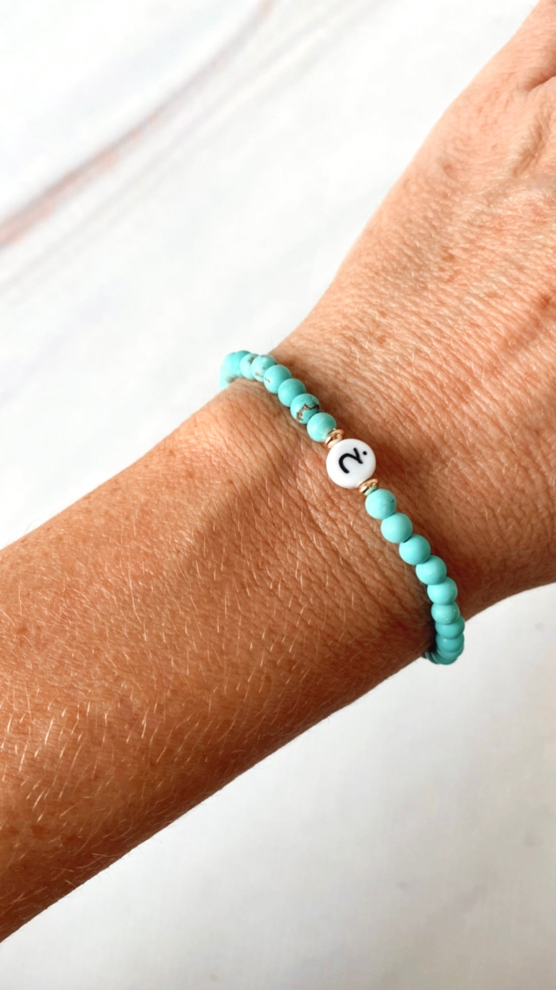 Skinny Arabic initial bracelet