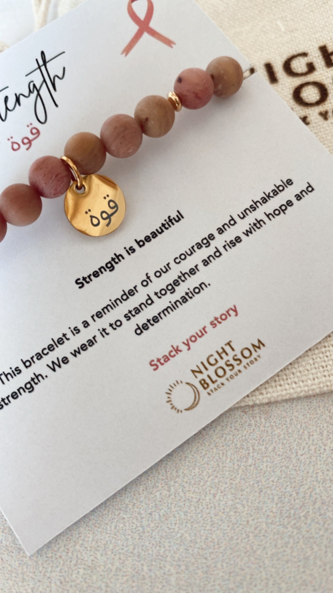 Think Pink Strength charm bracelet