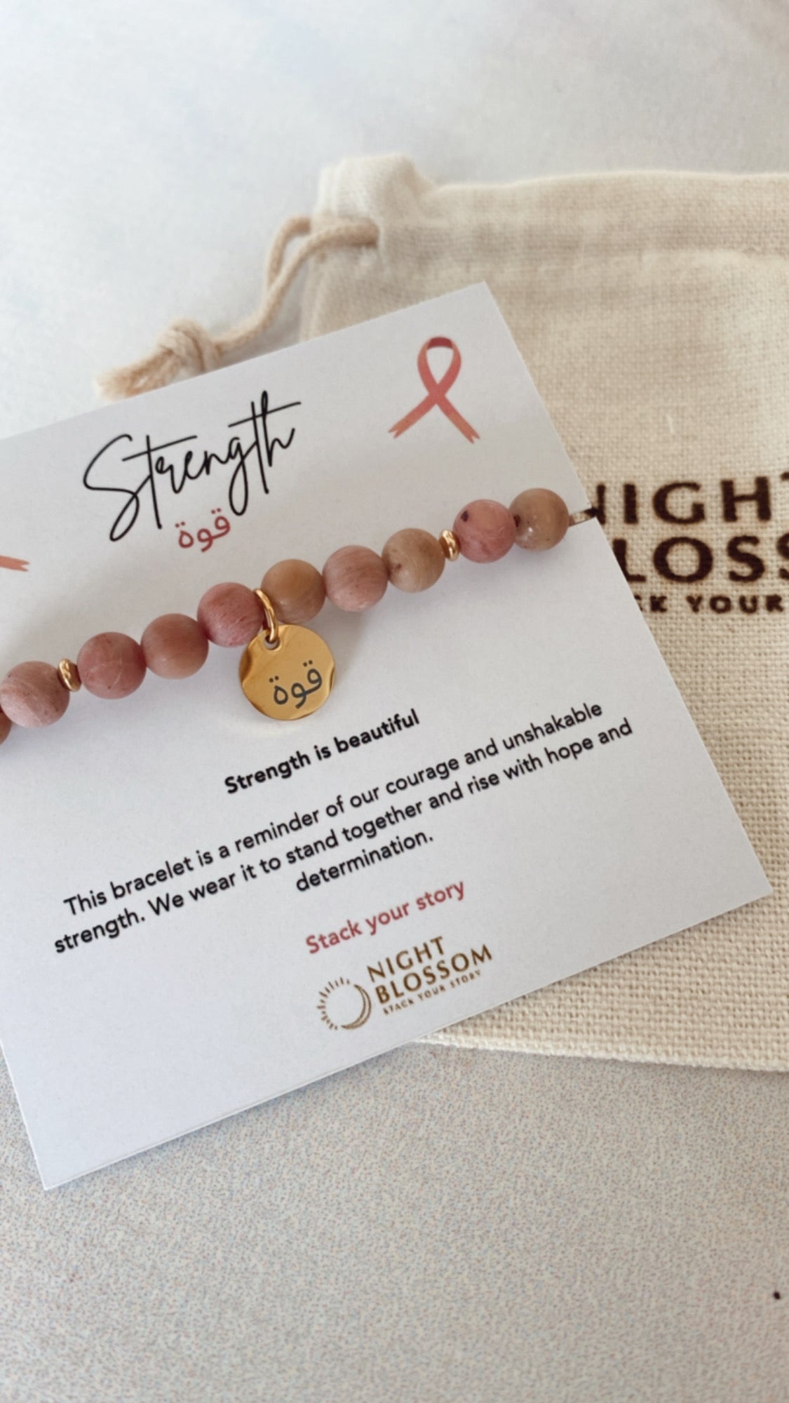 Think Pink Strength charm bracelet