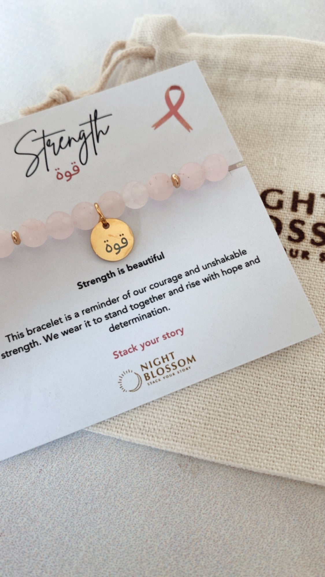 Think Pink Strength charm bracelet