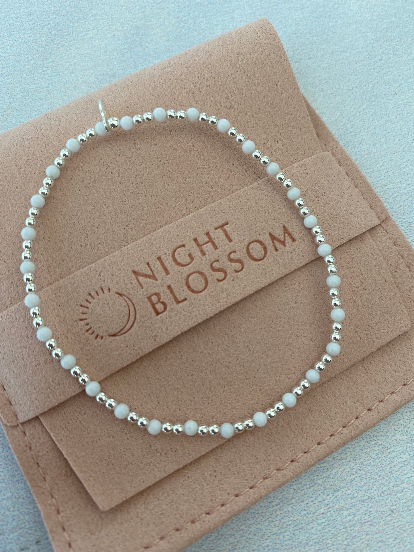 Silver beaded and stone stacking bracelets