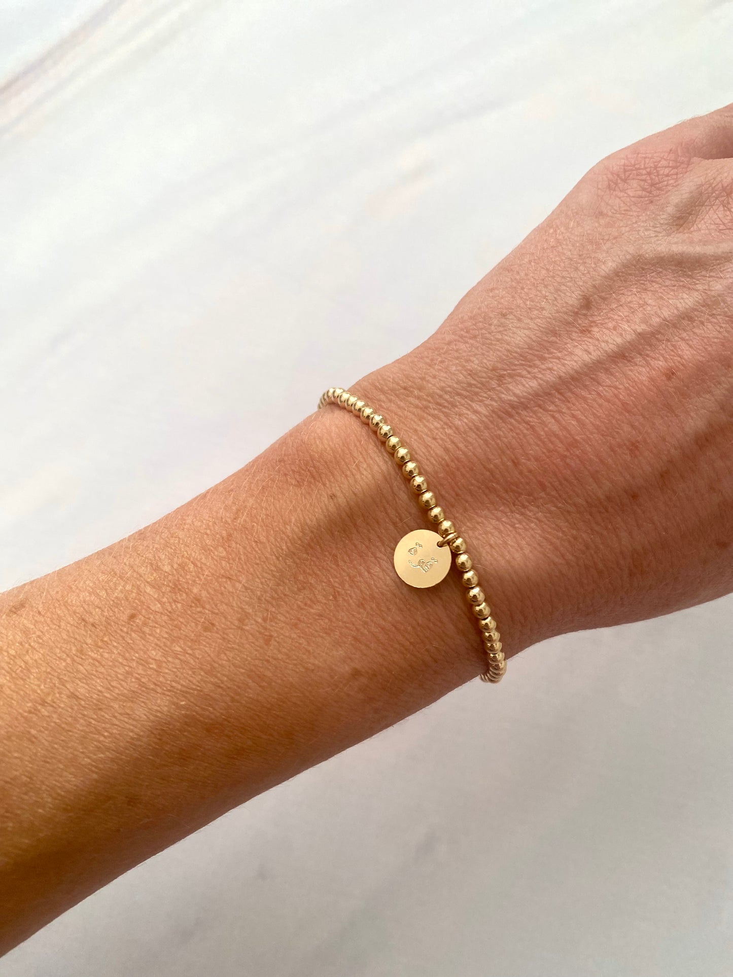 Arabic Strength Gold Charm Bracelet