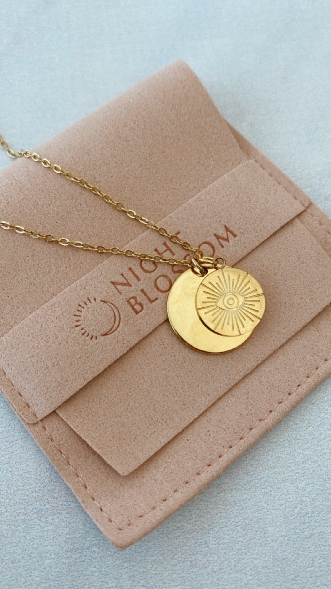 Double layer eye pendant