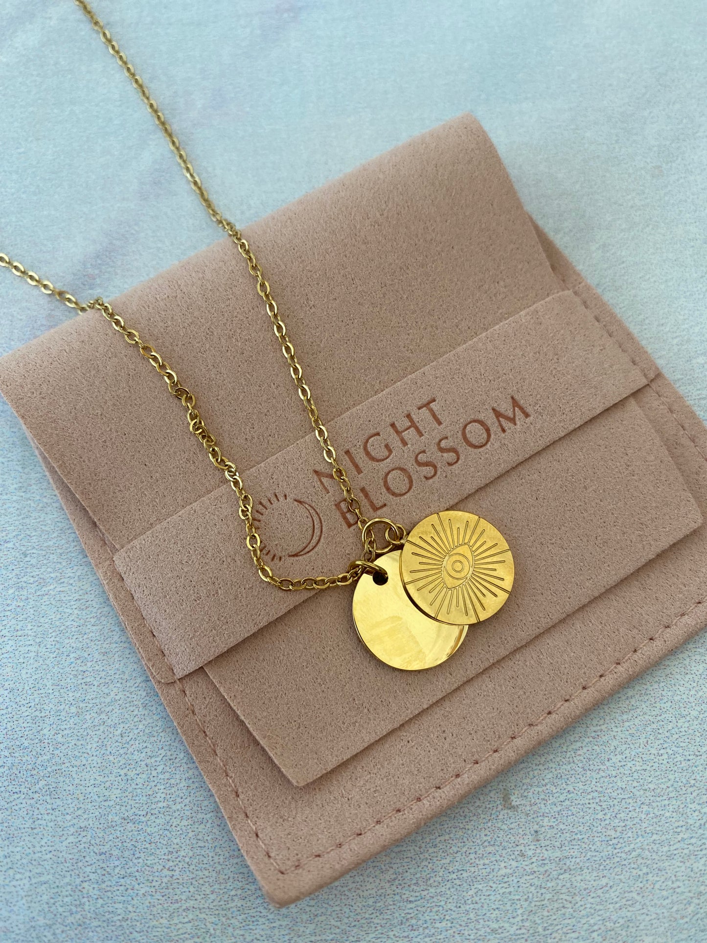 Double layer eye pendant