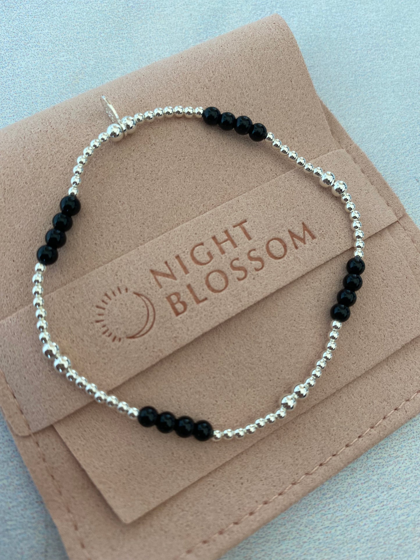 Silver beaded and stone stacking bracelets