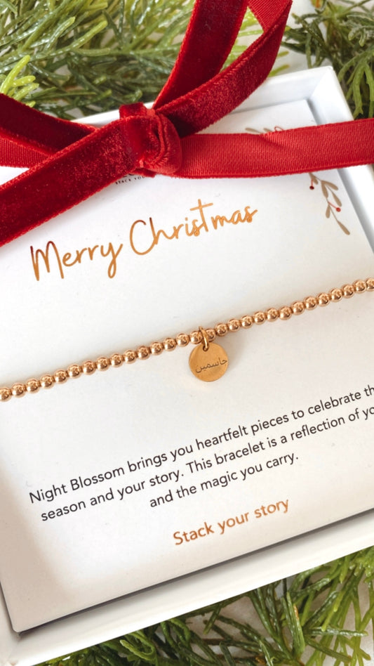 Festive gold personalised charm bracelet